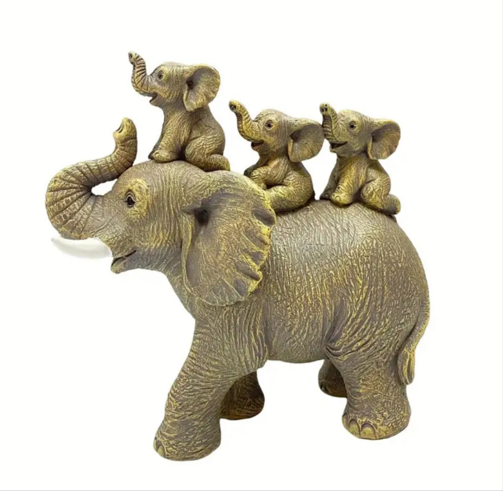 3 Baby Elephants Riding An Elephant Statue