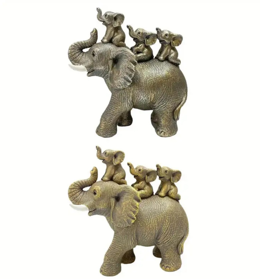 3 Baby Elephants Riding An Elephant Statue